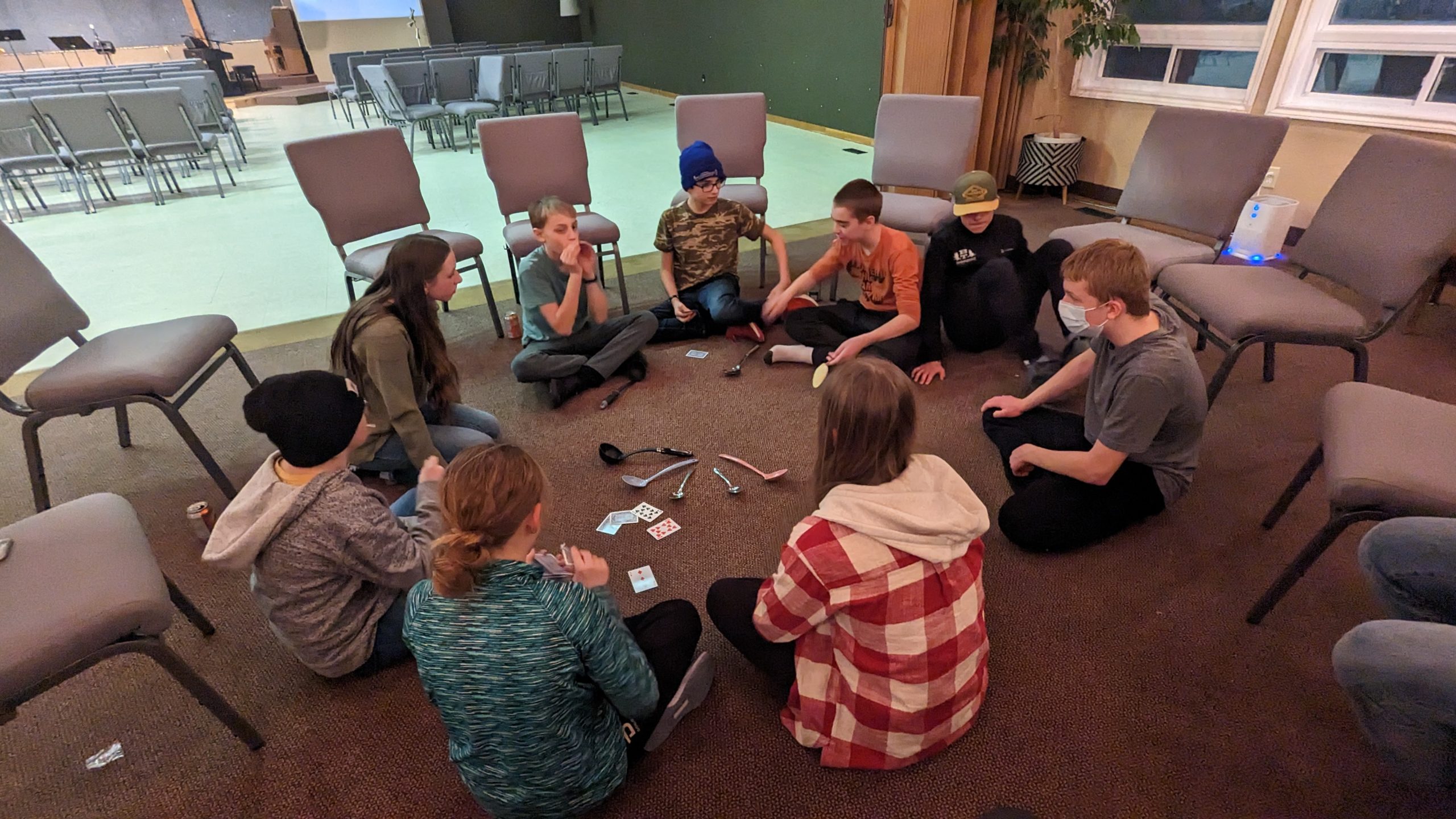 Youth group kids playing Spoons